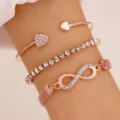 Elegante 3-delige roségouden sieradenset met hartmanchet en infinity armband met stras - Retro 3-Delige Set Combinatie / Rozegoud Set