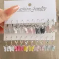 Set bunter Schmetterlings-Ohrringe aus Acryl in verschiedenen Farben auf einer Karte - Glänzend Silber Farbacryl Schmetterling Kombi (5608702HB)