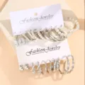 Elegantes silbernes geometrisches Ohrring-Set mit gedrehten Reifen, Perlen und Schmetterlingen - Silber Schmetterling Künstliche Perle Geometrische Creolen Set (5596402HB)