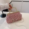 Elegant pink velvet evening clutch bag with pearl beads and butterfly embroidery motif - Pink