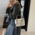 Modern cream white box style crossbody bag for women with decorative leather charm - With Pendant / Silver