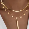 Elegant gold-tone layered necklace set with herringbone chain and bar pendant charm - Disk Tassel Style (5917202HB)