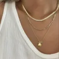 Elegant triple-layered gold necklace featuring a snake chain and hammered coin pendant - Coin OT Buckle Style (5957301HB)