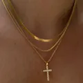 Three-piece layered gold necklace set featuring herringbone chain and crystal cross pendant - Pave Rhinestone Cross (6154001HB)