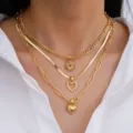 3-piece gold layered heart necklace set featuring Cuban, snake, and link chains - Heart 3-Piece Set (6186201HB)