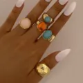 Vintage gold-tone alloy ring set featuring colorful gemstones and hammered irregular bands - Colored Artificial Gemstone Geometric Style (6503701HB) / 4 Pieces/Pack / Gold