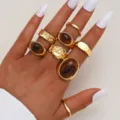 Conjunto de anillos boho vintage chapados en oro con piedras marrones y cabeza de león - Estilo abierto con incrustaciones de gemas (6614801HB)