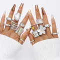 Juego de anillos bohemios de plata vintage con diseños florales y geométricos, mujer - Juego Floral Irregular de Plata Líquida (6682201HB)