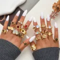 Juego de anillos apilables dorados vintage bohemios para mujer con piedras coloridas - Juego Floral Hueco de Gema del Dios Sol (6688201HB)