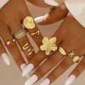Set de anillos dorados de estilo bohemio vintage con diseños de flores y conchas - Juego de Estrellas de Mar y Conchas Onduladas (6487701)