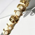 Elegante juego de anillos apilables bohemios dorados con piedras blancas y sol para mujer - Estilo Girasol Ojo de Tigre (6512803HB)