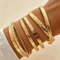 Stapelbares goldfarbenes Armreif-Set mit vintage Gravurmustern - 7-teiliges Set - Rautenmuster (6269701HB) / Gold