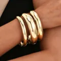 Stackable chunky gold bangles set for women with polished mirror finish - 3-Piece Set - Smooth Plain Rings (6377901) / Gold