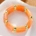 Elegante pulsera de resina marbreada naranja con detalles dorados para un look chic - Brazalete de Cuentas de Acrílico (6808005)