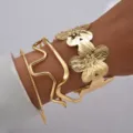 Elegant stacked gold bangles set with embossed flower cuff and wavy design - 花朵线条款式(6573901HB) / 4 Pieces / Gold