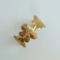 Luxury gold-tone wide cuff bracelet featuring three large textured floral motifs. - Three Large Brushed Flower Wide Open Bangle (6464901) / Gold