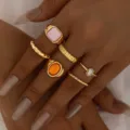 Conjunto de anillos de nudillos bohemios dorados con piedras de resina rosa y naranja - Estilo con Incrustaciones de Gemas (6617301)