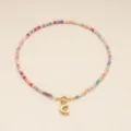 Collier de perles colorées bohème pour femmes avec un pendentif lettre G doré élégant - Lettre G / Or