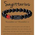 Pulsera del zodiaco Sagitario hecha de agata negra natural con piedra roja y abalorio de constelacion. - Sagitario