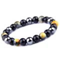 Bracelet de perles en pierre naturelle avec oeil de tigre coloré et perles volcaniques. - Lettre G