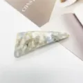 Close-up macro view of minimalist triangular resin hair clip with blue marble pattern - Off-White Fragmented (13)