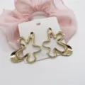 Detailed view of oversized gold geometric ocean series alloy earrings on white card - Irregular Geometric Lines (18)
