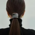 Elegant U-shaped oil drop ponytail cuff featuring a grey and gold wave textured design - Blue
