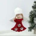 Detail shot of cute plush angel doll Christmas tree hanging ornament with white wings and red dress. - Winged Angel Pendant Red Body