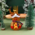 Christmas reindeer cutlery holder detail scene showing festive table decor with mini trees. - Deer Cutlery Holders