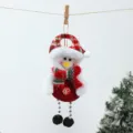 Detailed shot of cute plush snowman hanging ornament with plaid hat for Christmas tree decor. - New Chain Leg Snowman