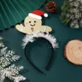 Christmas gingerbread man headband detail shot, featuring glitter holiday party hair accessories. - Christmas Headband - Waving Gingerbread Man