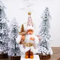 Detail shot of cute 5-inch plush Santa Claus holding a tree for Christmas party decor. - 5 Inch Pink Sequin Style