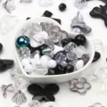Detailed macro view of mixed acrylic beads in a heart bowl for DIY jewelry making - 500g Pack / Black