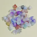 Detailed macro view of 11mm mixed color frosted lily of the valley flower beads - Iridescent Gradient Mix (NO.6)
