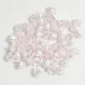 Macro detail of 11mm flower shaped lily-of-the-valley pearl beads for DIY jewelry crafts - Pearl Pink (NO.3)