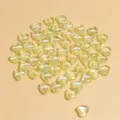 Primer plano detallado de cuentas de acrílico en forma de corazón irisado de 9mm para joyería. - 9mm (Aprox. 2700 Piezas) / Amarillo