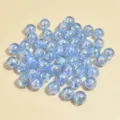 Close-up of 8mm iridescent light blue AB coated acrylic round beads for DIY jewelry making - 8mm / Medium Blue