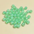Close-up detail of 8mm green iridescent AB acrylic beads for DIY jewelry making. - 8mm / Green