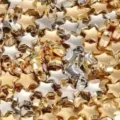 Macro view of 6mm electroplated star-shaped acrylic beads in gold and silver finish - 100 Pieces/Pack / Mixed Gold & Silver