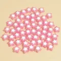 Vista macro de cuentas de acrílico en forma de estrella rosa y blanca de 8 mm para joyería DIY - Rosa