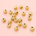 Detailansicht goldener strukturierter Acrylperlen für DIY-Schmuck und Bastelarbeiten - 8mm (15g/Packung) / Gold