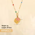 Detail of a stainless steel cube pendant featuring a pink flower and a smiley face design. - Rainbow Cube Flower (HPNK025) / Gold