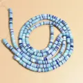Primer plano de cuentas heishi de arcilla polimérica de 6 mm en azul y blanco mix - Mezcla de Azul y Blanco (36) / 1 Tira (aprox. 400 Piezas)