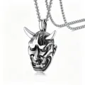 Close-up detail of retro stainless steel Hannya mask pendant for a hip-hop men's necklace. - 恶魔般若面具款式 / Silver
