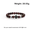 Red tiger eye stone beaded elastic bracelet with a vintage-style metal wheel charm - Red Tiger Eye Helm Style