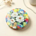 Detailed close-up of a portable compact makeup mirror with floral oil painting - Oil Painting Flowers - White Rose