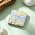 Close-up of the artistic oil painting pattern on a portable folding square makeup mirror. - Oil Painting Daisy And Moon (Style 2) / 7.3cm*7.2cm