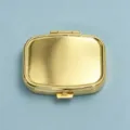 Compact gold metal pill box for medication or jewelry storage, sleek rectangular design. - Gold Square Plain Model