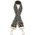 Detailed view of an adjustable leopard print bag strap with gold lurex threads. - Gold Thread Khaki Black Leopard (No. 6) / Silver Buckle