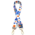 Detalle del estampado floral colorido en correa azul de bolso con clips de oro metálico. - N°21 Flor Pequeña Azul Lago Naranja